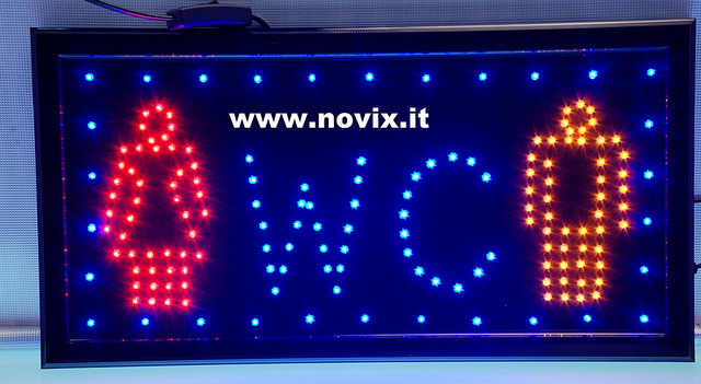 Illuminated sign written with WC LED.