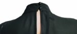 Blusa nera con un ornamento gioiello sul colletto By JAIME