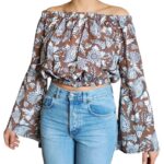 BLUSA CORTA A SPALLE SCPERTE C. MANICHE A CAMPANA SVASTATE E FANTASIA FLOREALE